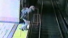 Subway Stops Inches Before Woman on Tracks
