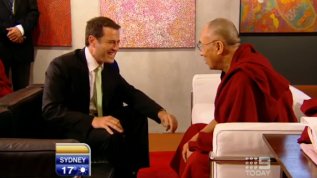The Dalai Lama walks into a pizza shop...